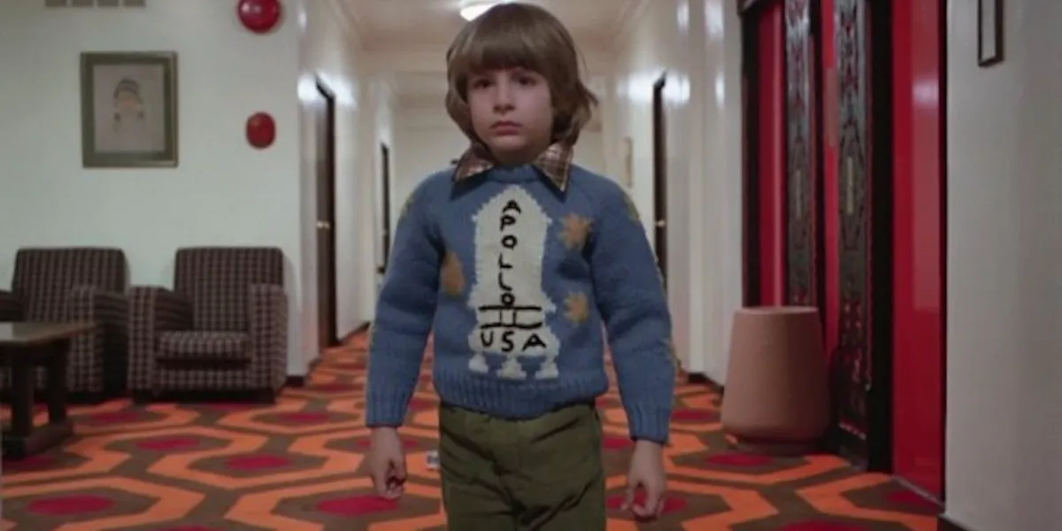 Danny Lloyd as Danny Torrance wearing an Apollo 11 sweater in Stanley Kubrick's film adaptation of Stephen King's The Shining