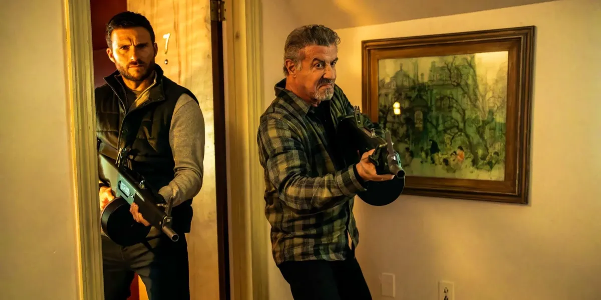Sylvester Stallone and Scott Eastwood hold shotguns in Alarum