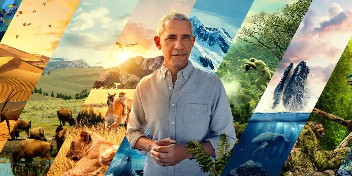 Barack Obama is standing in front of a collage of different habitats.