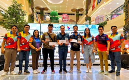 <p><strong>CHESS TOURNEY</strong>. Participants and organizers of the Rotary International District 3820 Open Rapid chess tournament which ended at SM City in Santo Tomas, Batangas on Saturday (June 8, 2024). From left are Dr. Fred Paez (Rotary Club of Nuvali), Evans Frivaldo (Rotary Club of Cavinti), Andi Cullano (Rotary Club of Pagsanjan), IM Michael Concio Jr. (2nd place), Kevin Arquero (champion), Sherwin Tiu (3rd place), Ching Amante (Rotary Club of San Pablo Central), DDG Jay Estrellado and Bren Sasot (Rotary Club of Nuvali). <em>(Contributed photo)</em></p>