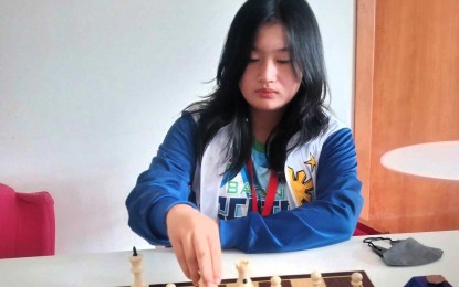 <p><strong>CHAMPION.</strong> Jirah Floravie Cutiyog won the girls Under-16 title in the standard event of the National Age Group Chess Championships Eliminations at the Oriental Convention Center in Dumaguete City on June 4, 2024. She advanced to the Grand Finals set in Dapitan City, Zamboanga del Norte from June 22-30. <em>(Contributed photo)</em></p>