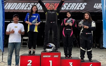 <p><strong>FILIPINO PRIDE.</strong> The Philippines' Bella Cañete (center) rules the Women Drift Challenge Pro-Am and the NewGen categories of the Indonesian Drift Series in Tangerang City, Banten province on May 3 and 4, 2025. The 13-year-old from La Union beat hometown bets in both divisions. <em>(Contributed photo)</em></p>