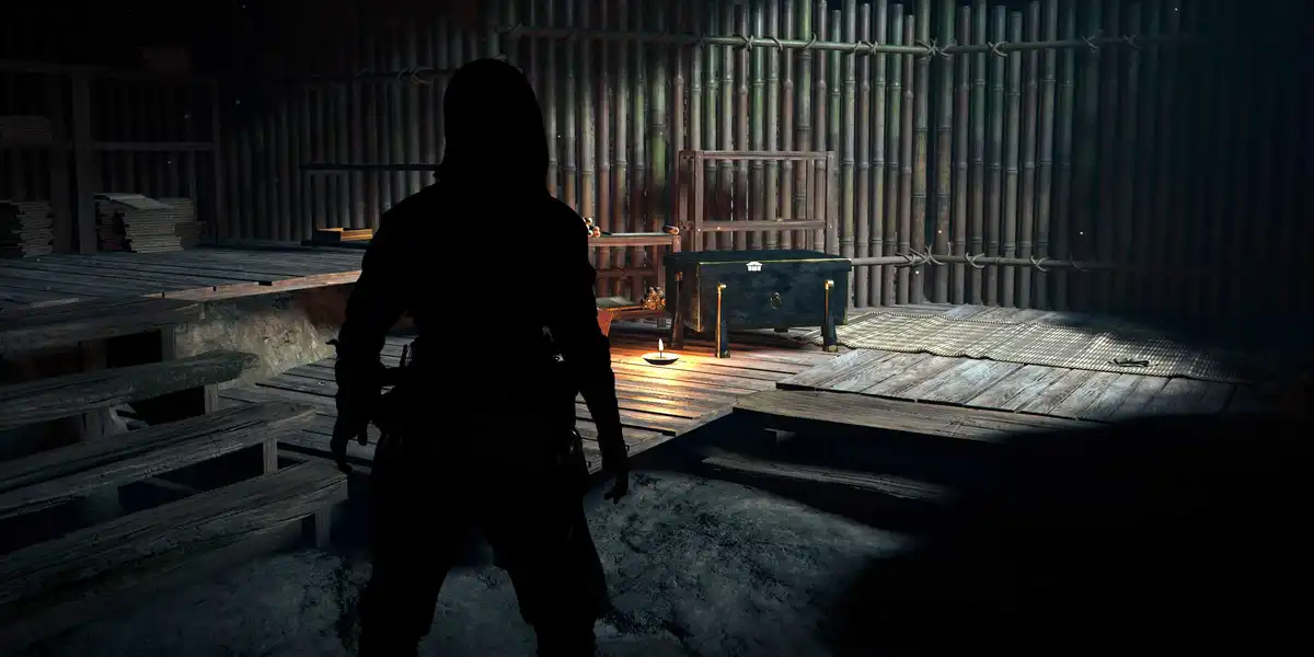 Naoe by a treasure chest in the Chasuriyama Kofun in Assassin's Creed Shadows