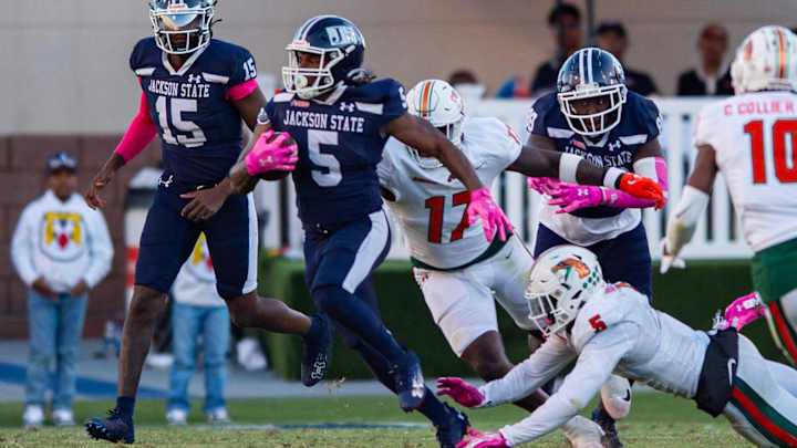 Jackson State Tigers' running back Irv Mulligan (5) runs the ball during the game against the Florida A&M Rattlers in Jackson, Miss., on Saturday, Oct. 19, 2024. Jackson State Tigers' running back Irv Mulligan (5) runs the ball during the game against the Florida A&M Rattlers in Jackson, Miss., on Saturday, Oct. 19, 2024.