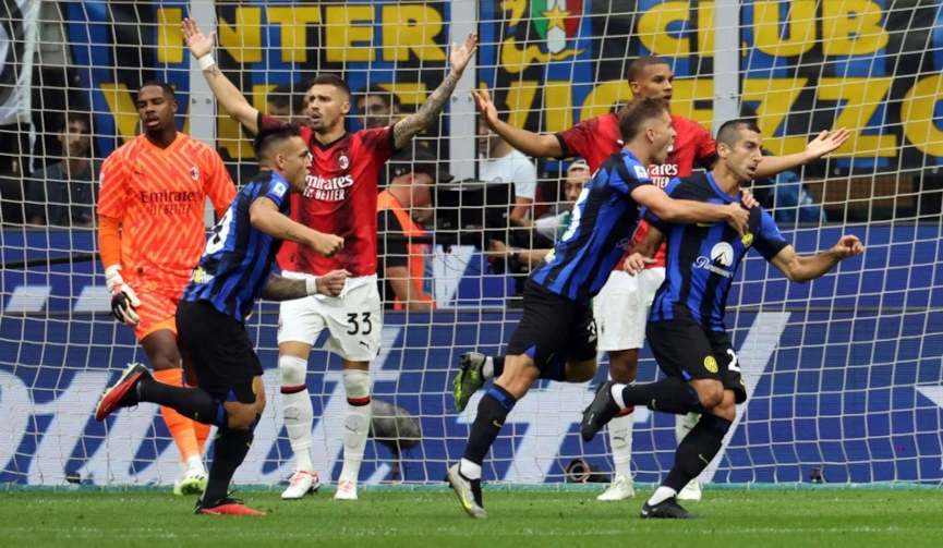 Inter Milan’s Henrikh Mkhitaryan (R) celebrates scoring the 1-0 opening goal during the Italian Serie A soccer match between Inter Milan and AC Milan in Milan, Italy, 16 September 2023. EPA-EFE/MATTEO BAZZI
