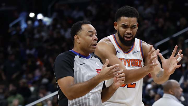 Dec 28, 2024; Washington, District of Columbia, USA; New York Knicks center Karl-Anthony Towns (32) argues with referee Karl Lane (77) during a timeout against the Washington Wizards in the first quarter at Capital One Arena. Mandatory Credit: Geoff Burke-Imagn Images Dec 28, 2024; Washington, District of Columbia, USA; New York Knicks center Karl-Anthony Towns (32) argues with referee Karl Lane (77) during a timeout against the Washington Wizards in the first quarter at Capital One Arena. Mandatory Credit: Geoff Burke-Imagn Images
