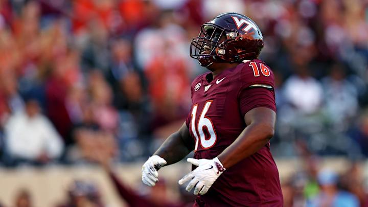 Sep 7, 2024; Blacksburg, Virginia, USA; Virginia Tech Hokies defensive lineman Aeneas Peebles (16) celebrates after a sack during the second quarter against the Marshall Thundering Herd at Lane Stadium. Sep 7, 2024; Blacksburg, Virginia, USA; Virginia Tech Hokies defensive lineman Aeneas Peebles (16) celebrates after a sack during the second quarter against the Marshall Thundering Herd at Lane Stadium.
