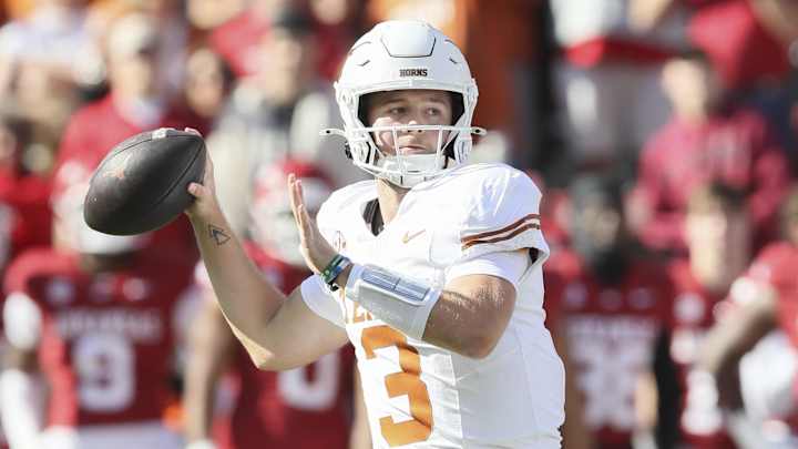 Nov 16, 2024; Fayetteville, Arkansas, USA; Texas Longhorns quarterback Quinn Ewers (3) passes in the first quarter against the Arkansas Razorbacks at Donald W. Reynolds Razorback Stadium. Mandatory Credit: Nelson Chenault-Imagn Images Nov 16, 2024; Fayetteville, Arkansas, USA; Texas Longhorns quarterback Quinn Ewers (3) passes in the first quarter against the Arkansas Razorbacks at Donald W. Reynolds Razorback Stadium. Mandatory Credit: Nelson Chenault-Imagn Images
