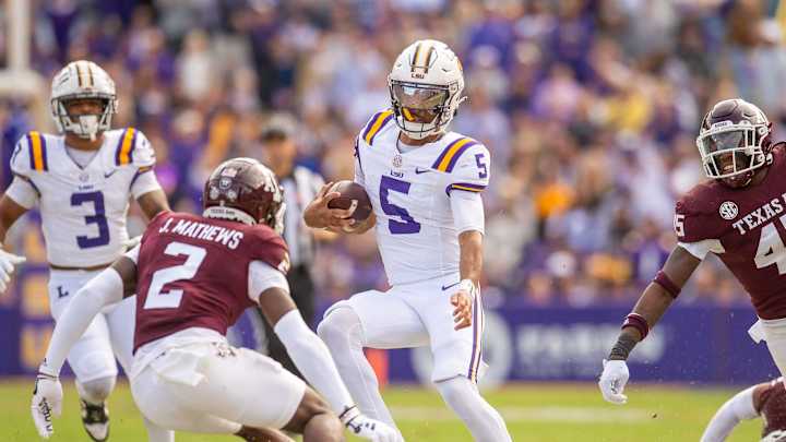 Tigers quarterback Jayden Daniels 5 runs the ball as the LSU Tigers take on Texas A&M in Tiger Tigers quarterback Jayden Daniels 5 runs the ball as the LSU Tigers take on Texas A&M in Tiger