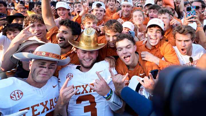 Texas Longhorns quarterback Quinn Ewers (3) and Michael Taaffe (16) celebrate following the Red River Rivalry college football game against the University of Oklahoma Sooners. Texas Longhorns quarterback Quinn Ewers (3) and Michael Taaffe (16) celebrate following the Red River Rivalry college football game against the University of Oklahoma Sooners.