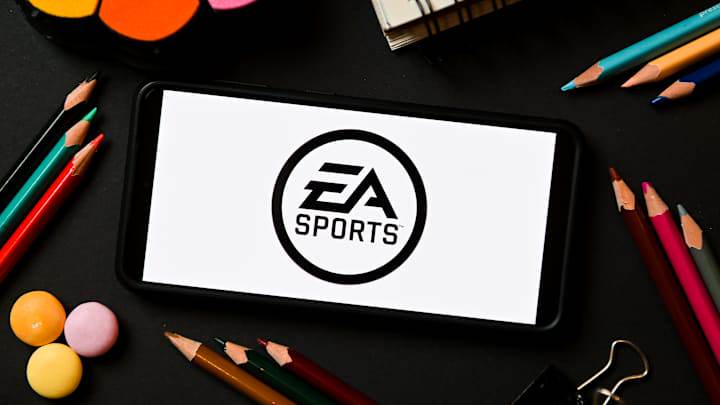 In this photo illustration a EA Sports logo seen displayed... In this photo illustration a EA Sports logo seen displayed...