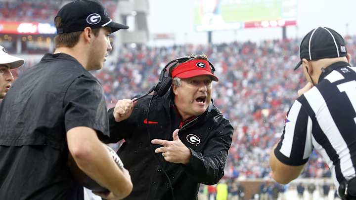 Nov 9, 2024; Oxford, Mississippi, USA; Georgia Bulldogs head coach Kirby Smart talks with an official during the first half against the Mississippi Rebels at Vaught-Hemingway Stadium. Mandatory Credit: Petre Thomas-Imagn Images Nov 9, 2024; Oxford, Mississippi, USA; Georgia Bulldogs head coach Kirby Smart talks with an official during the first half against the Mississippi Rebels at Vaught-Hemingway Stadium. Mandatory Credit: Petre Thomas-Imagn Images