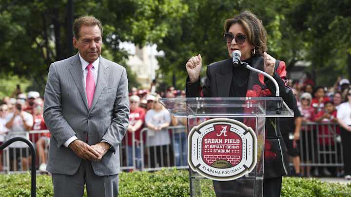 Sep 7, 2024; Tuscaloosa, Alabama, USA; Former Alabama head coach Nick Saban listens as his wife Terry Saban speaks as the University of Alabama renames the field in his honor at Bryant-Denny Stadium. The new name is Saban Field at Bryant-Denny Stadium Sep 7, 2024; Tuscaloosa, Alabama, USA; Former Alabama head coach Nick Saban listens as his wife Terry Saban speaks as the University of Alabama renames the field in his honor at Bryant-Denny Stadium. The new name is Saban Field at Bryant-Denny Stadium