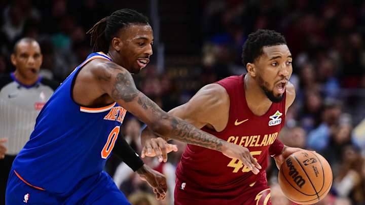 Apr 2, 2025; Cleveland, Ohio, USA; Cleveland Cavaliers guard Donovan Mitchell (45) drives to the basket against New York Knicks guard Delon Wright (0) during the second half at Rocket Arena. Mandatory Credit: Ken Blaze-Imagn Images Apr 2, 2025; Cleveland, Ohio, USA; Cleveland Cavaliers guard Donovan Mitchell (45) drives to the basket against New York Knicks guard Delon Wright (0) during the second half at Rocket Arena. Mandatory Credit: Ken Blaze-Imagn Images