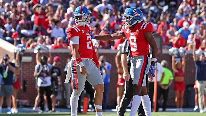 Jaxson Dart #2 and Tre Harris #9 of the Mississippi Rebels celebrate during the game against the Middle Tennessee Blue Raiders at Vaught-Hemingway Stadium on September 07, 2024 in Oxford, Mississippi. Jaxson Dart #2 and Tre Harris #9 of the Mississippi Rebels celebrate during the game against the Middle Tennessee Blue Raiders at Vaught-Hemingway Stadium on September 07, 2024 in Oxford, Mississippi.