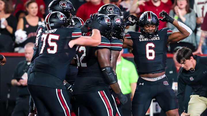 Nov 2, 2024; Columbia, South Carolina, USA; South Carolina Gamecocks tight end Joshua Simon (6) celebrates a touchdown reception against the Texas A&M Aggies in the first quarter at Williams-Brice Stadium. Mandatory Credit: Jeff Blake-Imagn Images Nov 2, 2024; Columbia, South Carolina, USA; South Carolina Gamecocks tight end Joshua Simon (6) celebrates a touchdown reception against the Texas A&M Aggies in the first quarter at Williams-Brice Stadium. Mandatory Credit: Jeff Blake-Imagn Images
