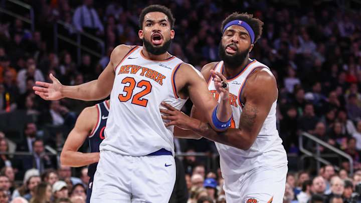 Mar 26, 2025; New York, New York, USA; New York Knicks center Karl-Anthony Towns (32) is restrained by center Mitchell Robinson (23) in the fourth quarter against the LA Clippers at Madison Square Garden. Mandatory Credit: Wendell Cruz-Imagn Images Mar 26, 2025; New York, New York, USA; New York Knicks center Karl-Anthony Towns (32) is restrained by center Mitchell Robinson (23) in the fourth quarter against the LA Clippers at Madison Square Garden. Mandatory Credit: Wendell Cruz-Imagn Images