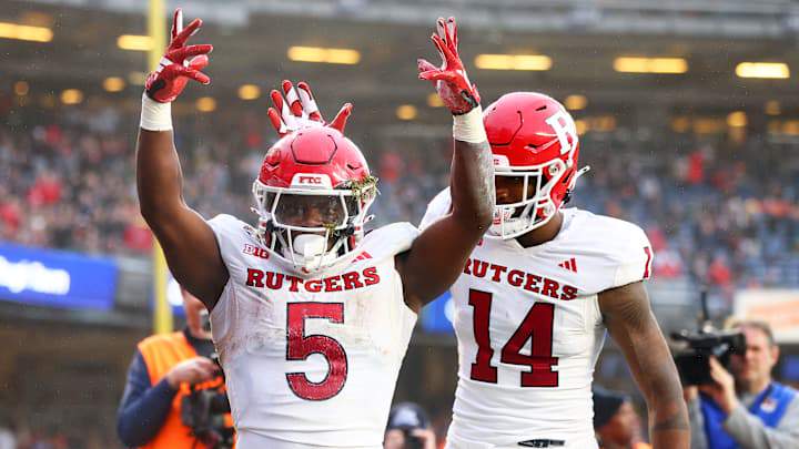 Kyle Monangai #5 of the Rutgers Scarlet Knights celebrates his second quarter rushing touchdown with Isaiah Washington #14 \V during the Bad Boy Mowers Pinstripe Bowl at Yankee Stadium on December 28, 2023 in New York City. Kyle Monangai #5 of the Rutgers Scarlet Knights celebrates his second quarter rushing touchdown with Isaiah Washington #14 \V during the Bad Boy Mowers Pinstripe Bowl at Yankee Stadium on December 28, 2023 in New York City.