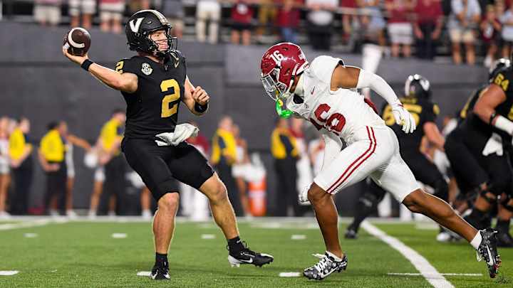 Vanderbilt Commodores quarterback Diego Pavia (2) throws the ball against Alabama Crimson Tide defensive back Red Morgan (16) Vanderbilt Commodores quarterback Diego Pavia (2) throws the ball against Alabama Crimson Tide defensive back Red Morgan (16)