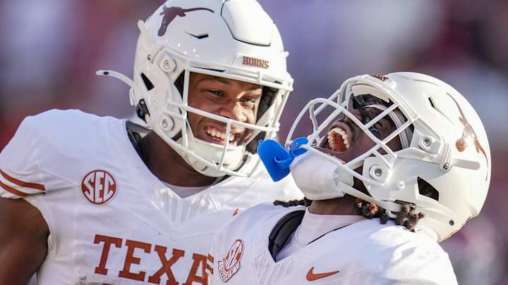 Texas Longhorns wide receiver Silas Bolden (11) and Texas Longhorns defensive back Xavier Filsaime (21) celebrates a touchdown in the third quarter during the Red River Rivalry Football Game between the University of Oklahoma Sooners and the University of Texas Longhorns at the Cotton Bowl Stadium in Dallas, TX Saturday, Oct. 12, 2024. Texas Longhorns wide receiver Silas Bolden (11) and Texas Longhorns defensive back Xavier Filsaime (21) celebrates a touchdown in the third quarter during the Red River Rivalry Football Game between the University of Oklahoma Sooners and the University of Texas Longhorns at the Cotton Bowl Stadium in Dallas, TX Saturday, Oct. 12, 2024.