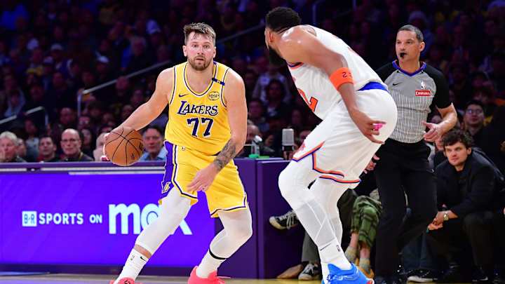 Mar 6, 2025; Los Angeles, California, USA; Los Angeles Lakers guard Luka Doncic (77) moves the ball against New York Knicks center Karl-Anthony Towns (32) during the second half at Crypto.com Arena. Mandatory Credit: Gary A. Vasquez-Imagn Images Mar 6, 2025; Los Angeles, California, USA; Los Angeles Lakers guard Luka Doncic (77) moves the ball against New York Knicks center Karl-Anthony Towns (32) during the second half at Crypto.com Arena. Mandatory Credit: Gary A. Vasquez-Imagn Images