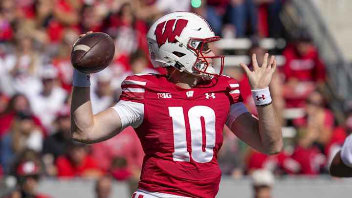 Sep 7, 2024; Madison, Wisconsin, USA; Wisconsin Badgers quarterback Tyler Van Dyke (10) throws a pass during the second quarter against the South Dakota Coyotes at Camp Randall Stadium. Mandatory Credit: Jeff Hanisch-Imagn Images Sep 7, 2024; Madison, Wisconsin, USA; Wisconsin Badgers quarterback Tyler Van Dyke (10) throws a pass during the second quarter against the South Dakota Coyotes at Camp Randall Stadium. Mandatory Credit: Jeff Hanisch-Imagn Images