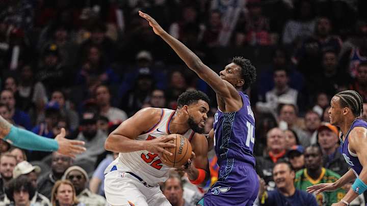 Mar 20, 2025; Charlotte, North Carolina, USA; New York Knicks center Karl-Anthony Towns (32) presses against Charlotte Hornets forward Moussa Diabate (14) during the second half at Spectrum Center. Mandatory Credit: Jim Dedmon-Imagn Images Mar 20, 2025; Charlotte, North Carolina, USA; New York Knicks center Karl-Anthony Towns (32) presses against Charlotte Hornets forward Moussa Diabate (14) during the second half at Spectrum Center. Mandatory Credit: Jim Dedmon-Imagn Images