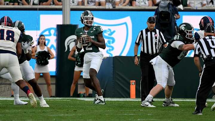 Aug 30, 2024; East Lansing, Michigan, USA; Michigan State Spartans quarterback Aidan Chiles (2) looks for an open receiver during the game against the Florida Atlantic Owls at Spartan Stadium. Mandatory Credit: Dale Young-USA TODAY Sports Aug 30, 2024; East Lansing, Michigan, USA; Michigan State Spartans quarterback Aidan Chiles (2) looks for an open receiver during the game against the Florida Atlantic Owls at Spartan Stadium. Mandatory Credit: Dale Young-USA TODAY Sports