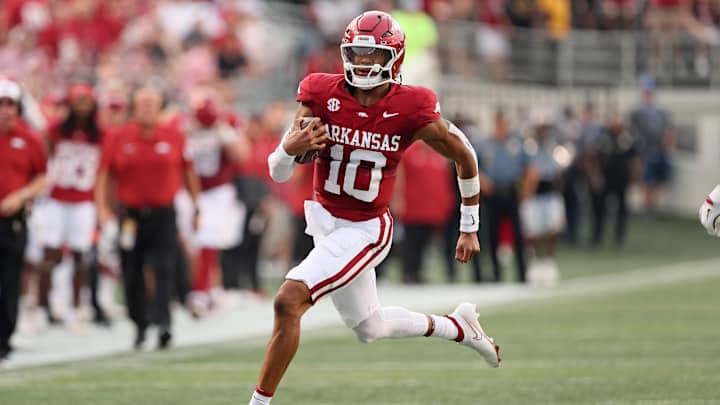 Aug 29, 2024; Little Rock, Arkansas, USA; Arkansas Razorbacks quarterback Taylor Green (10) rushes during the first quarter against the Pine Bluff Golden Lions at War Memorial Stadium. Mandatory Credit: Nelson Chenault-USA TODAY Sports Aug 29, 2024; Little Rock, Arkansas, USA; Arkansas Razorbacks quarterback Taylor Green (10) rushes during the first quarter against the Pine Bluff Golden Lions at War Memorial Stadium. Mandatory Credit: Nelson Chenault-USA TODAY Sports