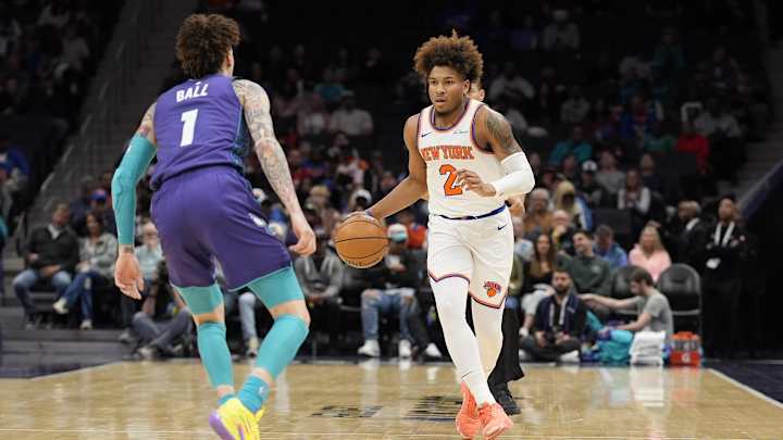 Mar 20, 2025; Charlotte, North Carolina, USA; New York Knicks guard Miles McBride (2) brings the ball up court against Charlotte Hornets guard LaMelo Ball (1) during the first quarter at Spectrum Center. Mandatory Credit: Jim Dedmon-Imagn Images Mar 20, 2025; Charlotte, North Carolina, USA; New York Knicks guard Miles McBride (2) brings the ball up court against Charlotte Hornets guard LaMelo Ball (1) during the first quarter at Spectrum Center. Mandatory Credit: Jim Dedmon-Imagn Images