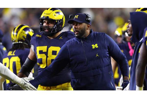 Michigan Wolverines raising $5 million to find an elite quarterback