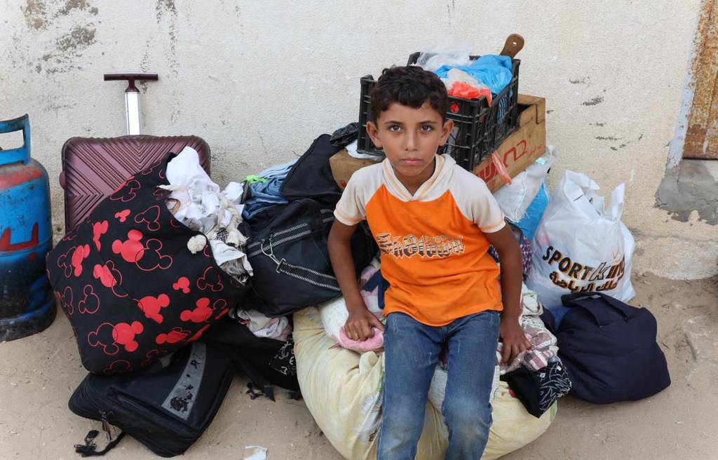 Kamal Al-Sultan, a displaced child from Beit Lahia in northern Gaza, has been forced to move seven times during the 10-month-long war. Kamal Al-Sultan, a displaced child from Beit Lahia in northern Gaza, has been forced to move seven times during the 10-month-long war.