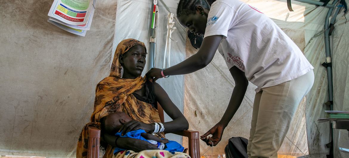 A woman is being screened for malnutrition in South Sudan. "Health is the last safety net. If it fails, everything else will also fall.", said Dr Humphrey Karamagi, the UN World Health Organization (WHO)’s Representative in South Sudan. A woman is being screened for malnutrition in South Sudan. "Health is the last safety net. If it fails, everything else will also fall.", said Dr Humphrey Karamagi, the UN World Health Organization (WHO)’s Representative in South Sudan.