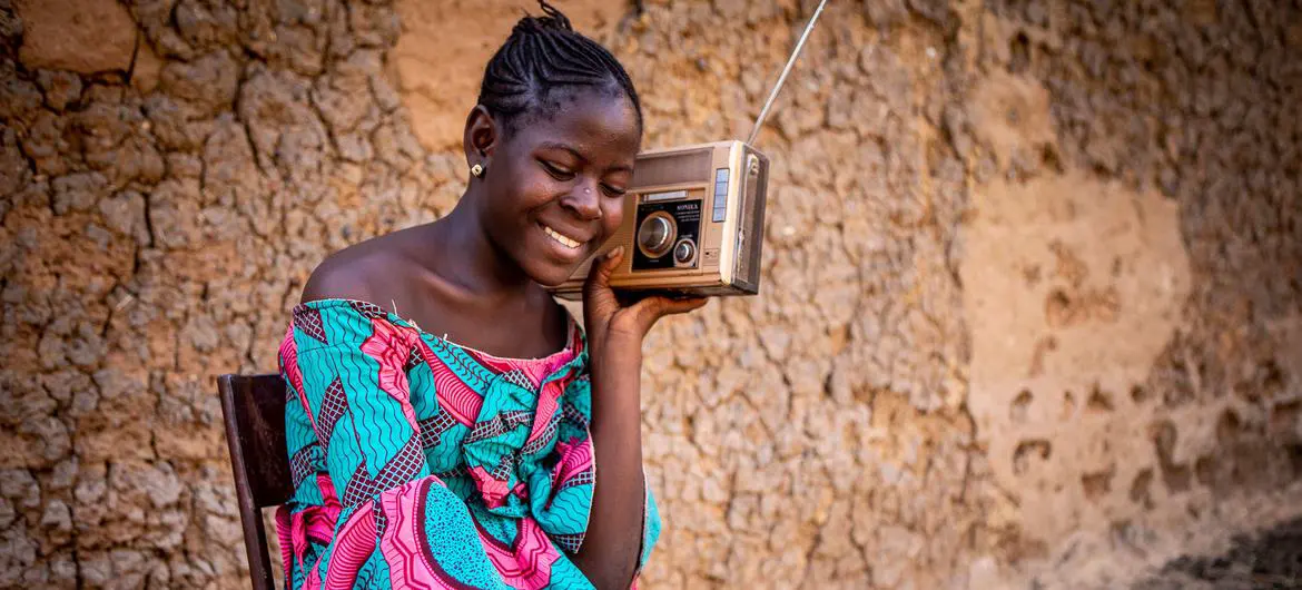 A ninth grade student follows her lessons on the radio in Mali. A ninth grade student follows her lessons on the radio in Mali.