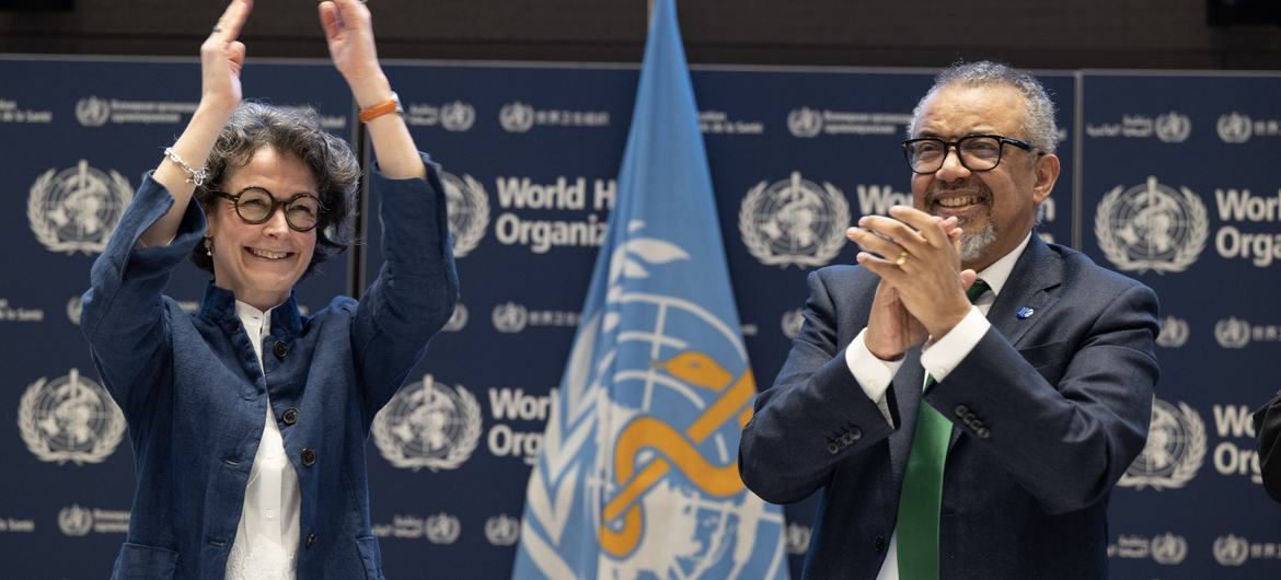 WHO Director-General Tedros Adhanom Ghebreyesus (right) and INB Co-Chair Anne-Claire Amprou of France (left) celebrate at the conclusion of negotiations in the early hours of 16 April 2025. WHO Director-General Tedros Adhanom Ghebreyesus (right) and INB Co-Chair Anne-Claire Amprou of France (left) celebrate at the conclusion of negotiations in the early hours of 16 April 2025.