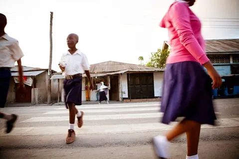 School children crossing a road