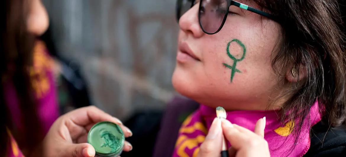 A woman participates in a march against gender violence in Quito, Ecuador. A woman participates in a march against gender violence in Quito, Ecuador.