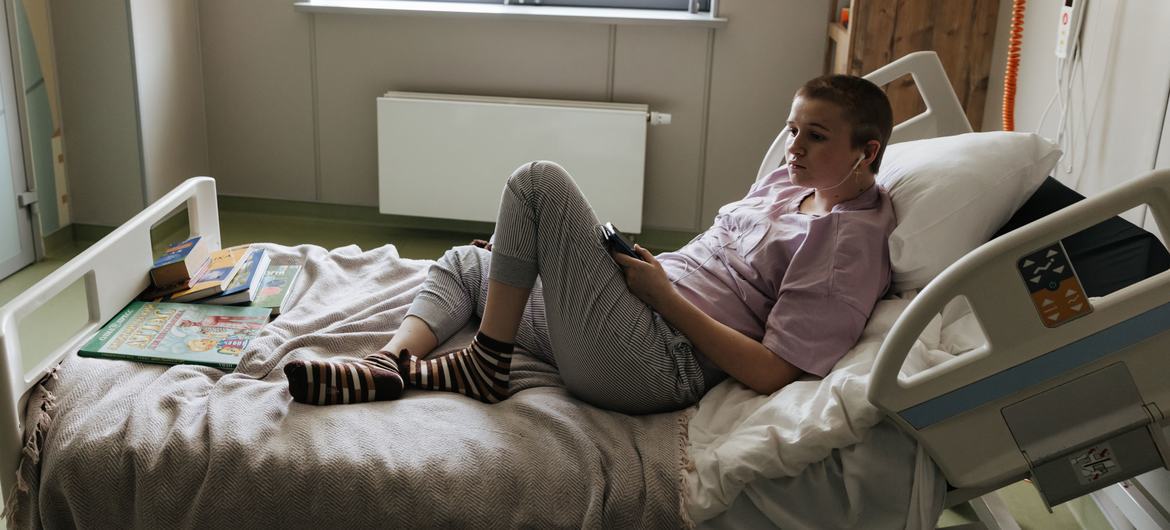 Sofia listens to music while lying on the bed of the specialized children's hospital ‘Okhmatdyt’ in Kyiv. She is recovering after surviving a shell attack. Sofia listens to music while lying on the bed of the specialized children's hospital ‘Okhmatdyt’ in Kyiv. She is recovering after surviving a shell attack.
