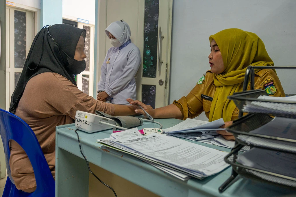 A victim of gender-based violence is counselled at the Sanguara Health Centre in Palu. A victim of gender-based violence is counselled at the Sanguara Health Centre in Palu.