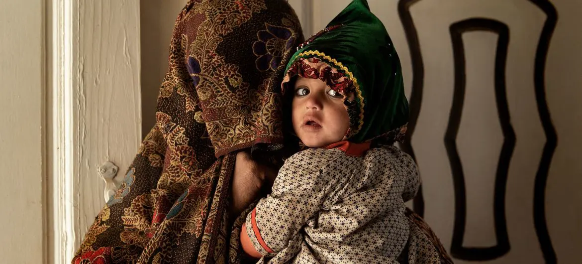 A mother and her child inside a medical clinic in Kandahar, Afghanistan. A mother and her child inside a medical clinic in Kandahar, Afghanistan.