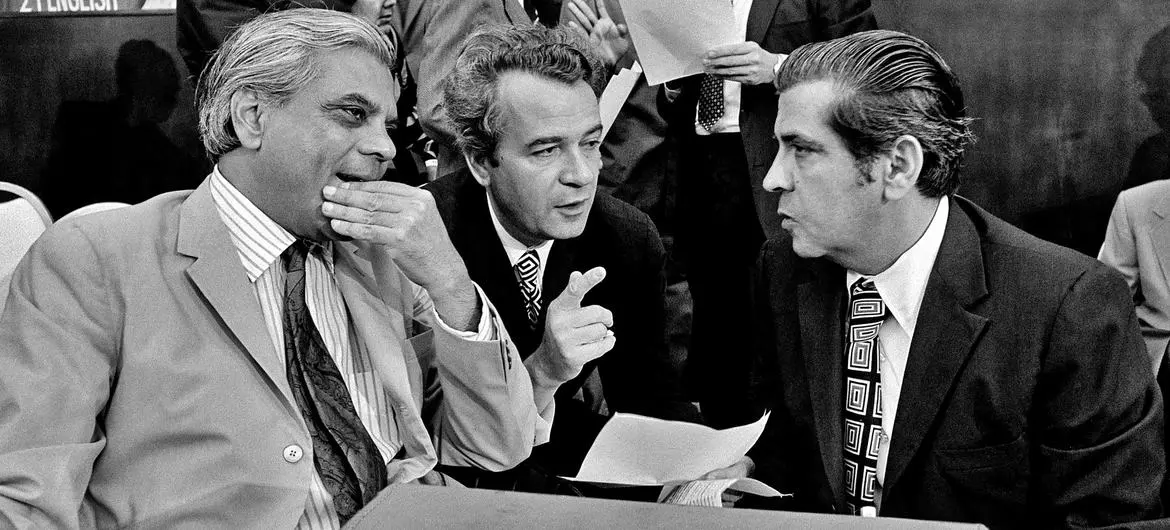 Council members from Pakistan, then-Yugoslavia and Panama discuss a draft resolution on Latin America before a meeting in Panama in 1973. (file) Council members from Pakistan, then-Yugoslavia and Panama discuss a draft resolution on Latin America before a meeting in Panama in 1973. (file)