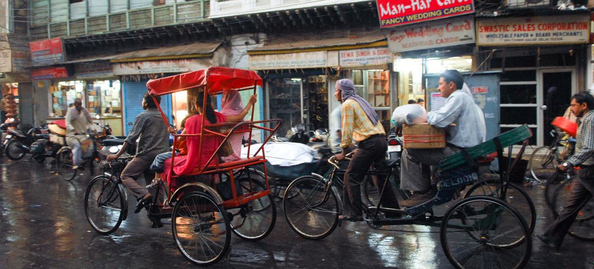 Cycle rickshaw drivers navigate the busy streets of Old Delhi, India – a livelihood for many in the informal economy. Cycle rickshaw drivers navigate the busy streets of Old Delhi, India – a livelihood for many in the informal economy.