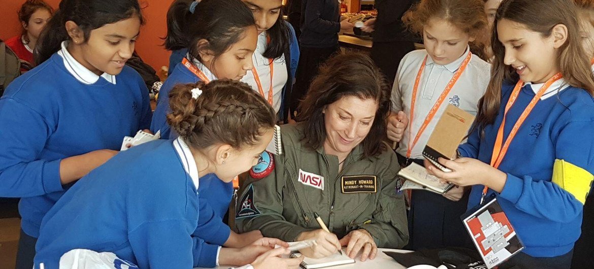 Mindy Howard signs autographs for girls after giving a TEDx talk at the British School in the Netherlands. Mindy Howard signs autographs for girls after giving a TEDx talk at the British School in the Netherlands.
