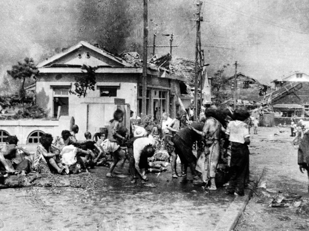Injured civilians, having escaped the raging inferno, gathered on a pavement west of Miyuki-bashi in Hiroshima, Japan, at about 11 a.m. on 6 August 1945. Injured civilians, having escaped the raging inferno, gathered on a pavement west of Miyuki-bashi in Hiroshima, Japan, at about 11 a.m. on 6 August 1945.