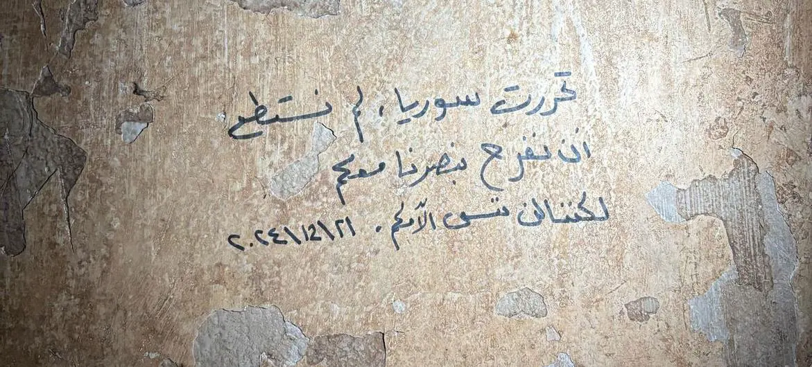 A message on the walls of Sednaya prison reads: 'Syria is free; we couldn't celebrate our victory with you, but we will not forget your pain.' A message on the walls of Sednaya prison reads: 'Syria is free; we couldn't celebrate our victory with you, but we will not forget your pain.'