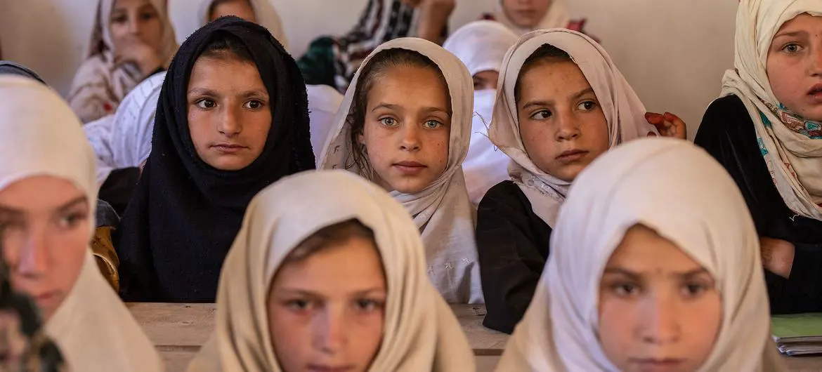 A group of elementary school girls sit in their classroom at a high school in Nuristan Province, Afghanistan. A group of elementary school girls sit in their classroom at a high school in Nuristan Province, Afghanistan.