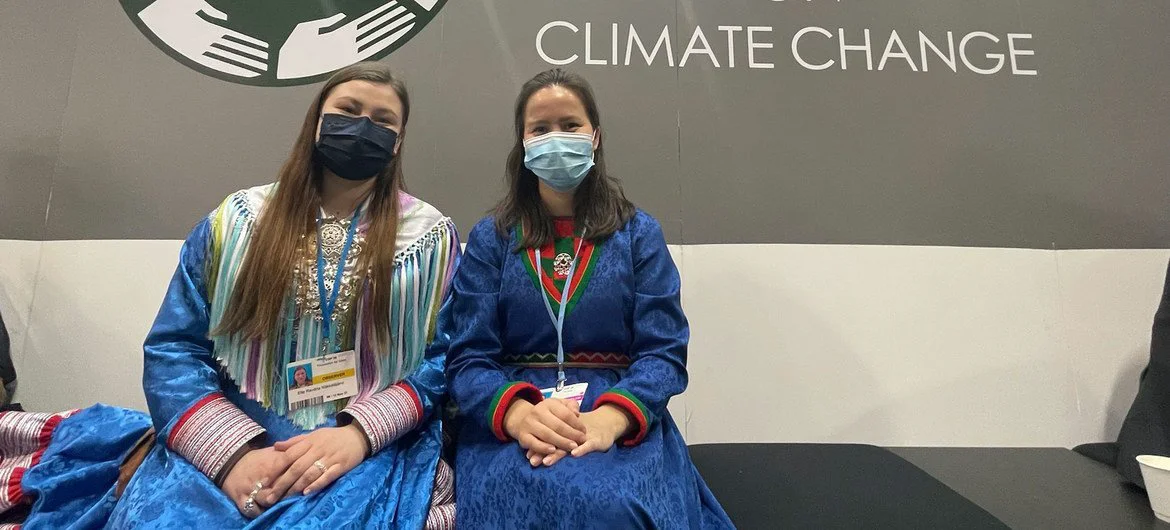 Indigenous young women representatives of the Sami People at the COP26 pavilions.