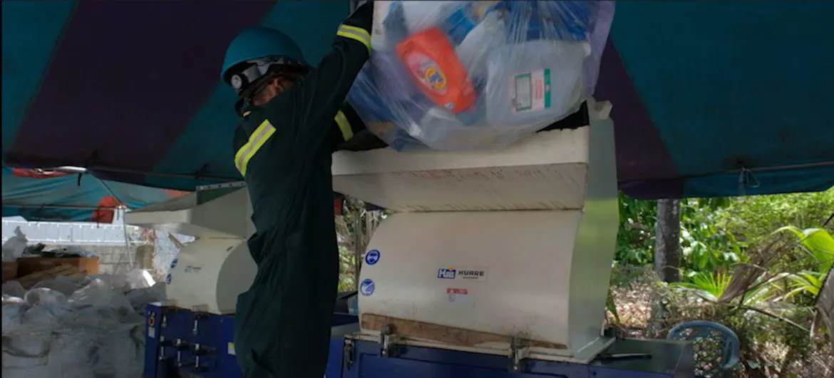 Plastic waste is shredded before being turned into lumber at a factory in Arima, Trinidad