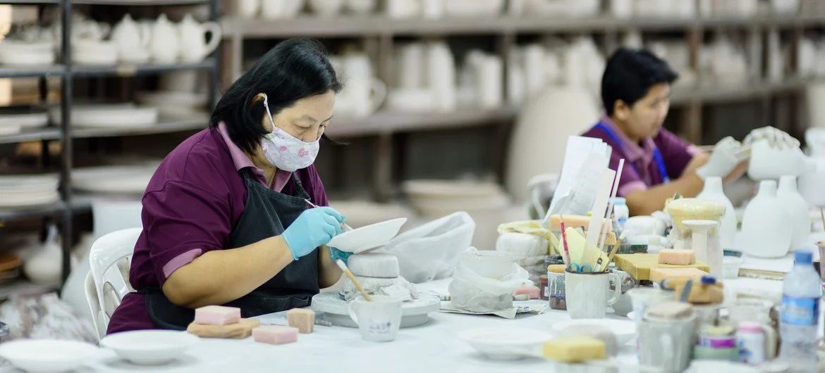 Women migrant workers at a ceramics factory in northern Thailand.