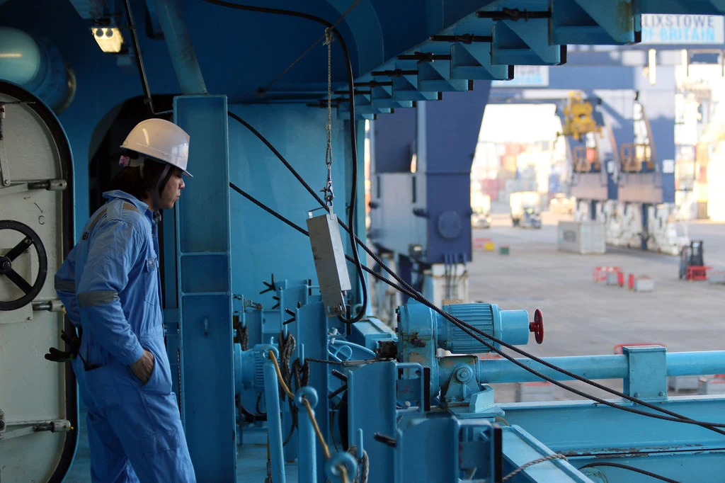 A seafarer on board a ship at Felixstowe Port in England.
